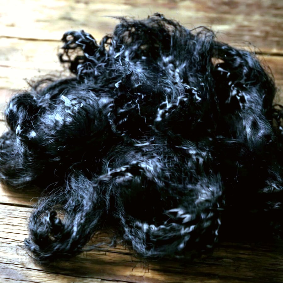 Dope dyed black recycled polyester staple fiber