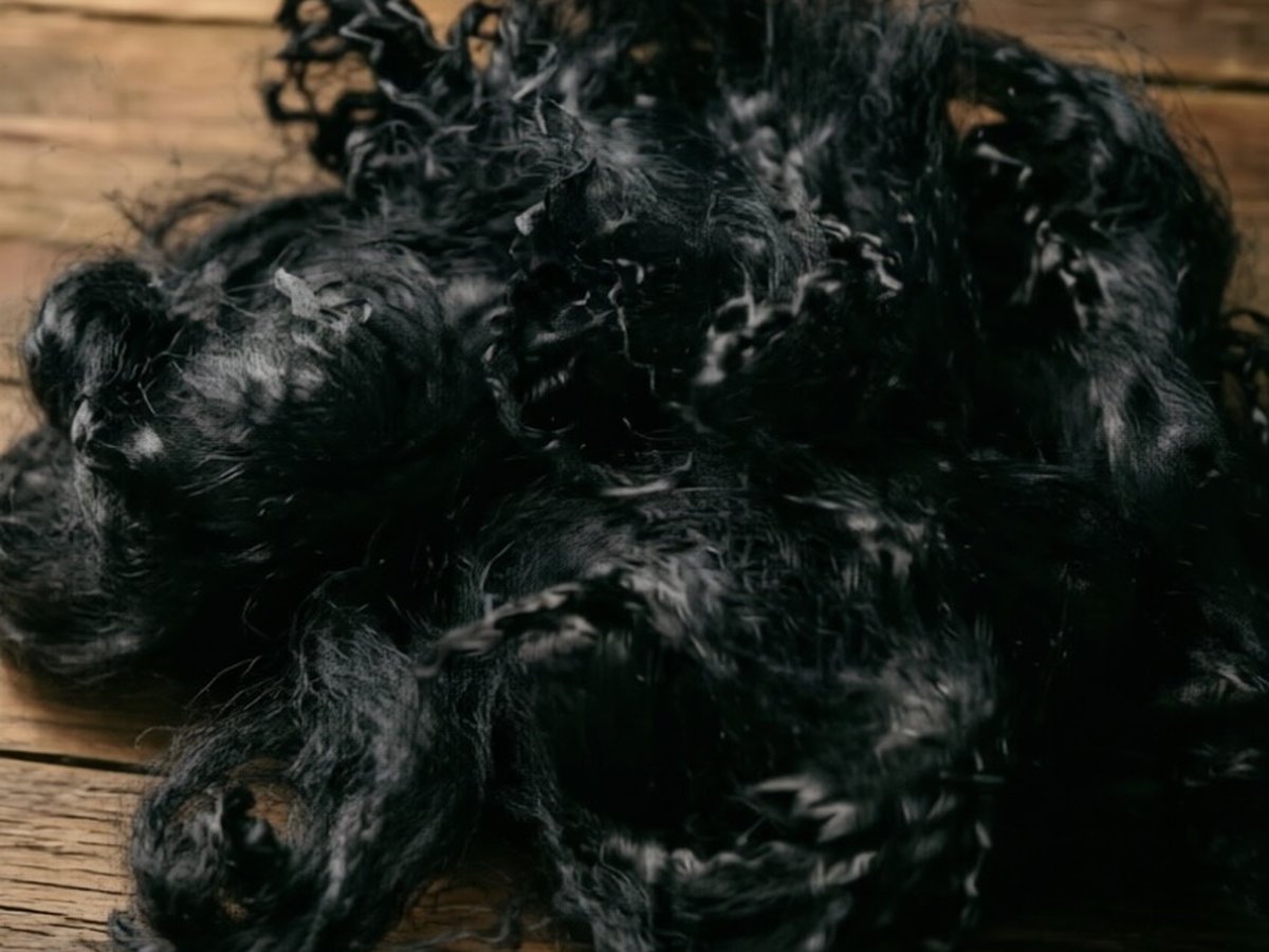 Dope dyed black recycled polyester staple fiber